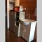 Grand Dhika Apartement by 2325 Studio room with cozy wooden style room