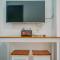 Fully Furnished and Homey 1BR Casa De Parco Apartment By Travelio