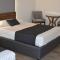 Estanza Hotel & Suites