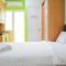 Stylish and Comfortable Studio Green Pramuka City Apartment By Travelio
