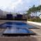 Modern Studio at Tifolia Apartment By Travelio