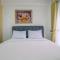 Modern Studio at Tifolia Apartment By Travelio