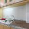 Modern Studio at Tifolia Apartment By Travelio