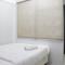 Bright and Comfy 2BR The Jarrdin Cihampelas Apartment By Travelio