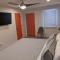 4411 Inn & Suites