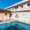 Casa na Praia Grande com piscina, churrasqueira e ar condicionado - 04 dormitórios - 乌巴图巴