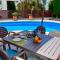 VILLA ALICIA with priv pool, beautiful garden and shady veranda- 5 min to the beach
