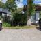 Welcome in - Vakantiewoning Noordendolfer 2-49, Tuin met zonnig terras, fietsenstalling, parkeerplaats, dichtbij zee en strand