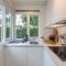 Welcome in - Vakantiewoning Noordendolfer 2-49, Tuin met zonnig terras, fietsenstalling, parkeerplaats, dichtbij zee en strand