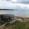 Paradise Beach Loghouse