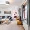 Dormie Cottage, lovely bright and spacious bungalow with wood fire