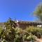 Casa Algarrobo by Rosas Cantares