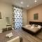 Sun Art Naples Rooms