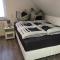 Ferienwohnung „Im Kleinen Löök“ - DG - 2 Zimmer - Balkon - Boxspringbett - 2 TV