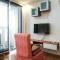 Cozy and Modern Studio Apartment at Belmont Residence Puri By Travelio