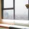 Cozy and Modern Studio Apartment at Belmont Residence Puri By Travelio