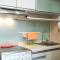Cozy and Modern Studio Apartment at Belmont Residence Puri By Travelio