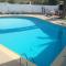 Impressive in ground floor with terrace of 2 rooms and pool