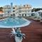 V Luxury Suites