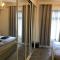 Sandy Pad's Apartments - Ріл