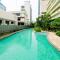 Pool View 2BR Apartment at Capitol Park Residence By Travelio