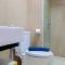 Pool View 2BR Apartment at Capitol Park Residence By Travelio