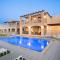 Irida beachfront Villa for 12 steps to amenities