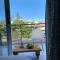 Retro n’ Boujee 1BR Apt with Pool and Balcony