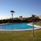 ATLANTERRA BAJO. SALIDA DIRECTA. URBANIZACIÓN DE LUJO. PISCINAS CANCHAS PÁDEL. WIFI Y A/A