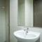 Comfortable Design Studio Apartment Ciputra International By Travelio