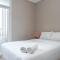 Comfortable Design Studio Apartment Ciputra International By Travelio