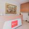 RedDoorz Plus near Soekarno Hatta Airport Taman Mahkota - 当格浪