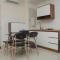 New and Cozy Living Stay 2BR Apartment at Grand Kamala Lagoon By Travelio