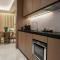Al Jaddaf Rotana Suite Hotel