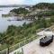 12 person holiday home in Fitjar
