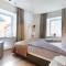 Riedz Apartments Innsbruck- Zentrales Apartmenthaus mit grüner Oase