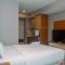 Comfortable Studio Grand Kamala Lagoon Apartment By Travelio