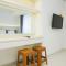 Relax and Comfy with Pool View at Studio West Vista Apartment By Travelio