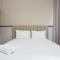 Comfortable Design 1BR Apartment Ciputra International By Travelio