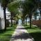 Guarajuba Porto Smeralda Village C02, térreo - GUARAJUBA TEMPORADA, viva mais de uma experiência de hospedagem conosco! 130m da praia