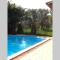 Loft mansardato con giardino e piscina in villa privata Loft with garden and swimming pool in a private villa