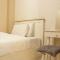 Comfy & Strategic 2BR Gateway Pasteur Apartment near Pasteur Exit Toll By Travelio