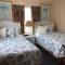 Carlton House Motel and Suites