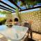 Asteraki Beach House by DadoVillas