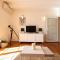 Apartment and Rooms Santini