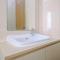 Comfortable and Spacious 2BR at Oasis Cikarang Apartment By Travelio