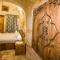kayadibi cave hotel - 于尔居普