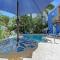 Ideal beach hideaway pool condo located between the island marina and beach
