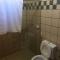 Linda casa Porto das Dunas: 4 suítes, churrasqueira e piscina