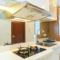 Relax Studio Apartment at Capitol Park Residence By Travelio